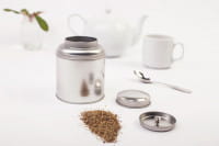 Okrągłe puszki na herbatę z pokrywką chroniącą aromat przechowywanych produktów